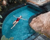Women on Vacation Floating in Pool